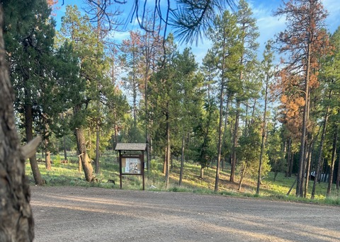 A gravel turnaround near the community bulletin board in Colcord Mountain Estates
